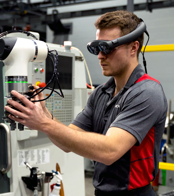 A PBC Linear worker uses Magic Leap's augmented reality platform with Taqtile's Manifest software.